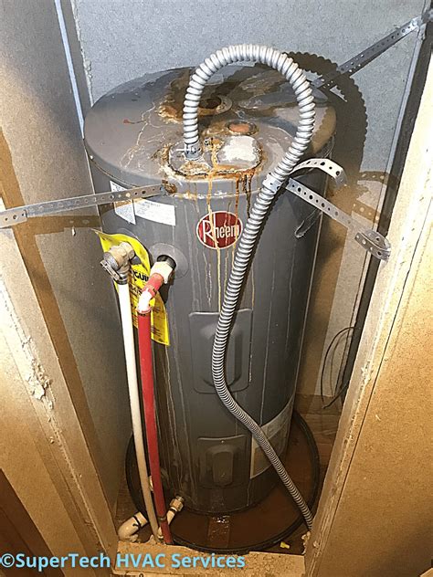 water heater leaking from top seam|Why Water Heater Leaking From Top & How to Fix It